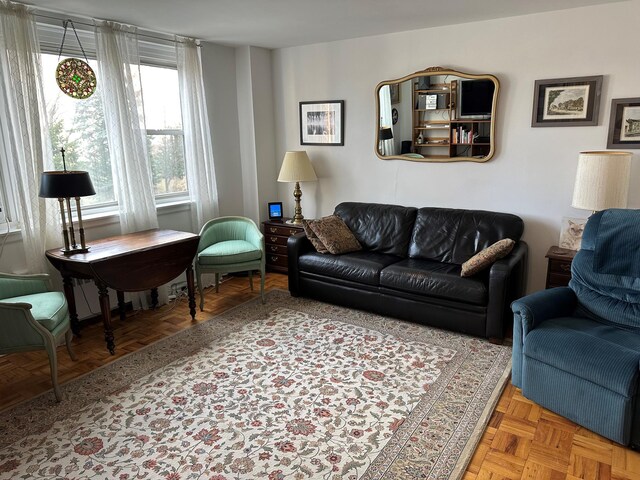 living room featuring light parquet floors