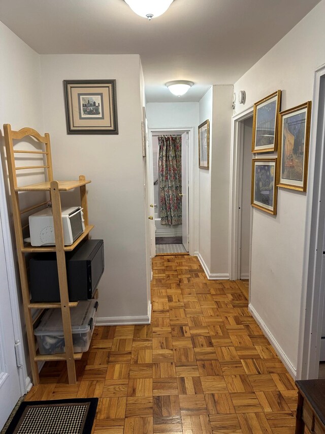 hallway with baseboards