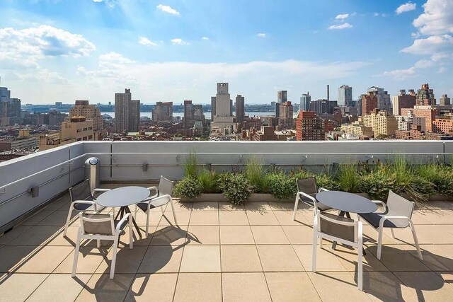 view of patio / terrace featuring a balcony