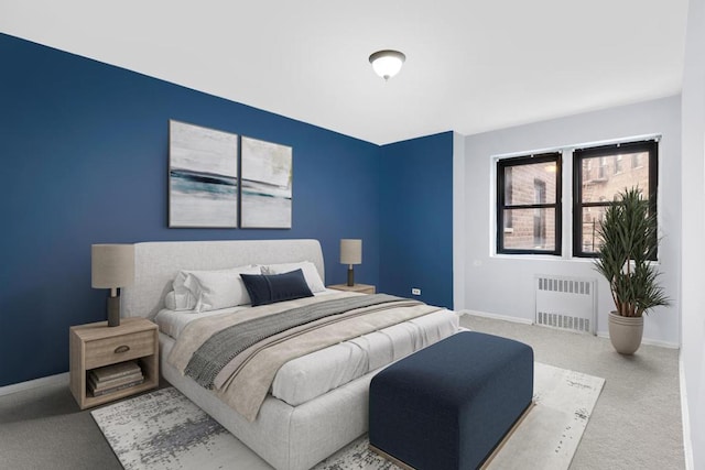 carpeted bedroom with radiator heating unit