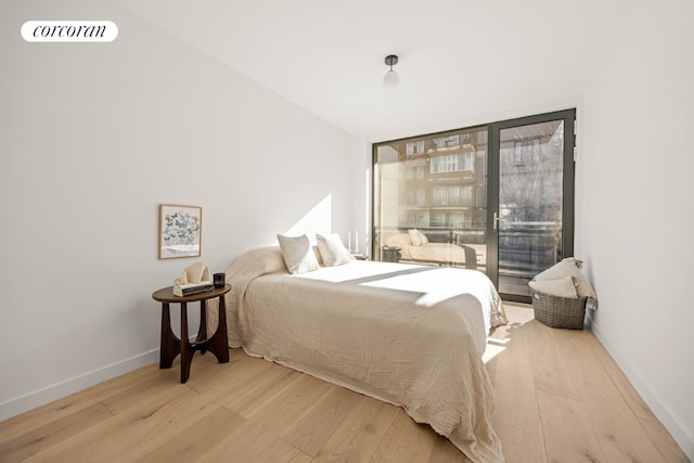 bedroom with light hardwood / wood-style floors