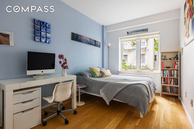 bedroom featuring light hardwood / wood-style flooring