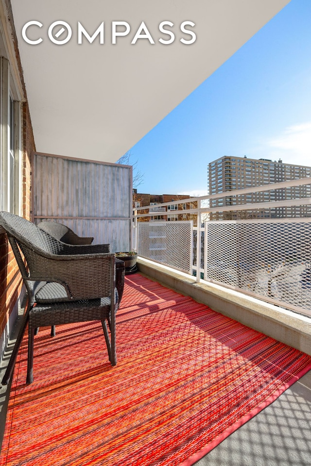 balcony featuring a view of city