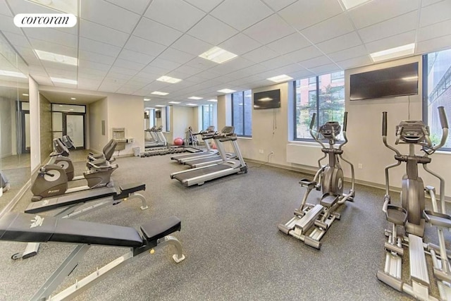 gym featuring a paneled ceiling