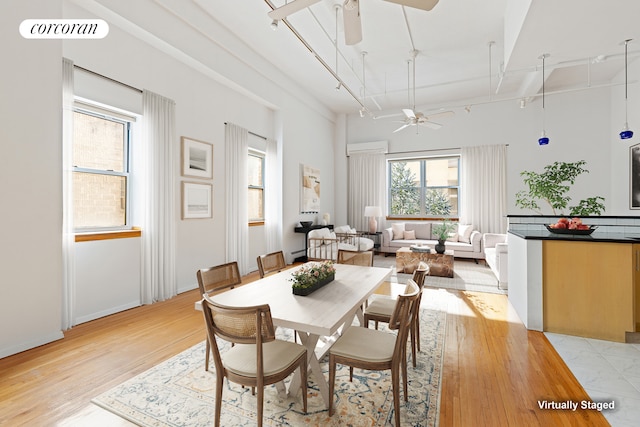 dining area with ceiling fan, light wood-type flooring, rail lighting, and visible vents