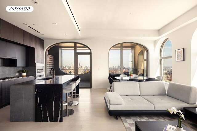 living area featuring a city view and visible vents