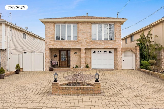 view of front of property featuring a garage