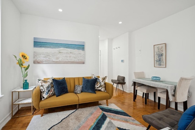 living room featuring parquet flooring