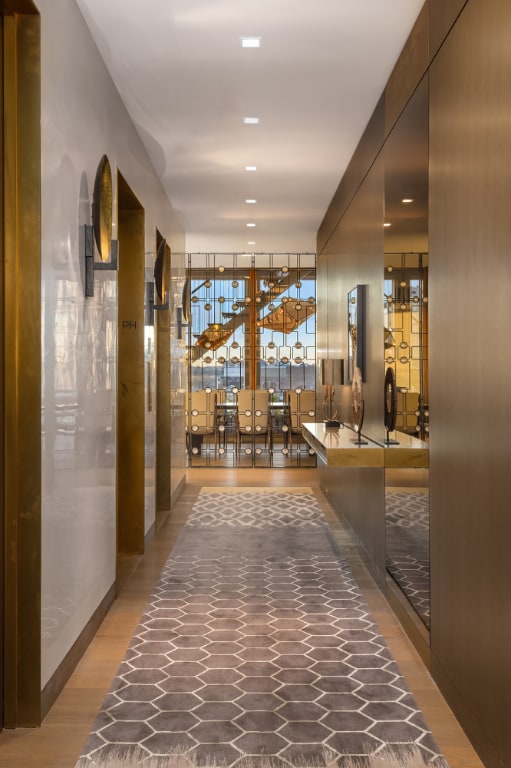 corridor featuring hardwood / wood-style floors