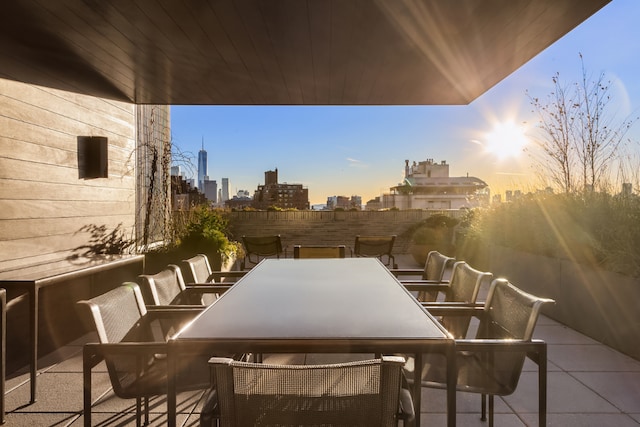 balcony at dusk with a patio area