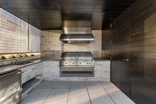 view of patio / terrace featuring area for grilling, sink, and grilling area