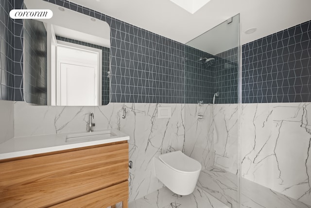 bathroom featuring tile walls, toilet, walk in shower, and vanity