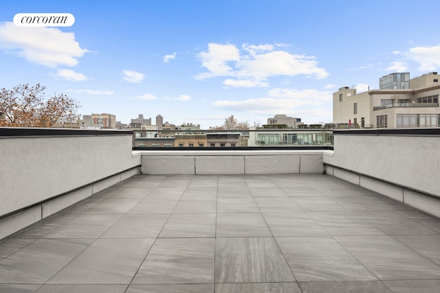 view of patio / terrace featuring a city view