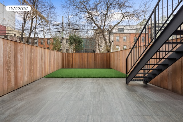 view of patio featuring a fenced backyard