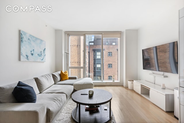 living area with light wood-style flooring