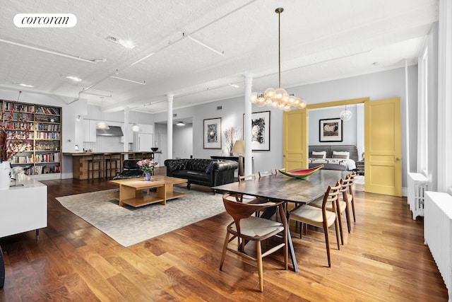 79 Worth St Unit 4R, New York City, NY 10013 - dining space featuring wood finished floors