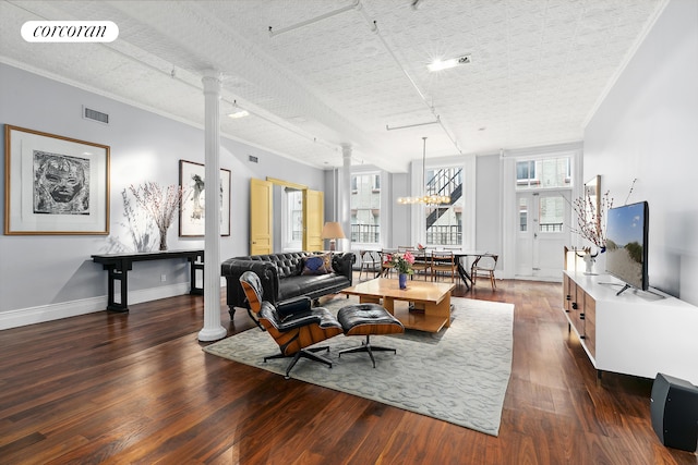 79 Worth St Unit 4R, New York City, NY 10013 - living area featuring ornate columns, dark wood-type flooring, ornamental molding, and baseboards