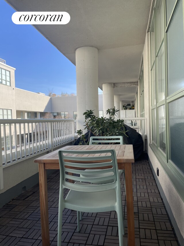 balcony featuring outdoor dining area