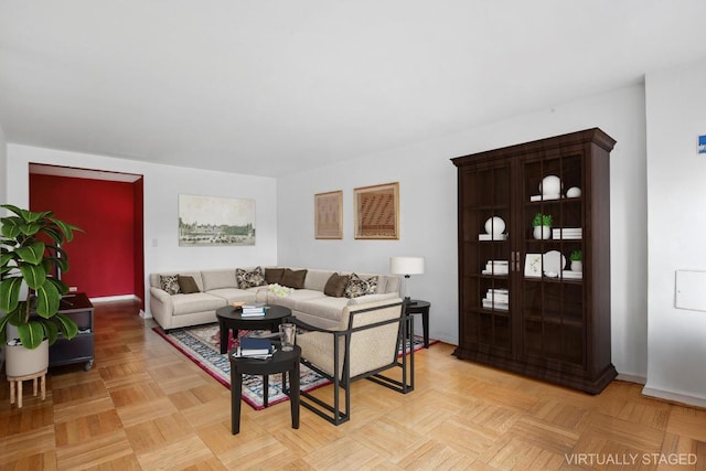 living room featuring light parquet flooring