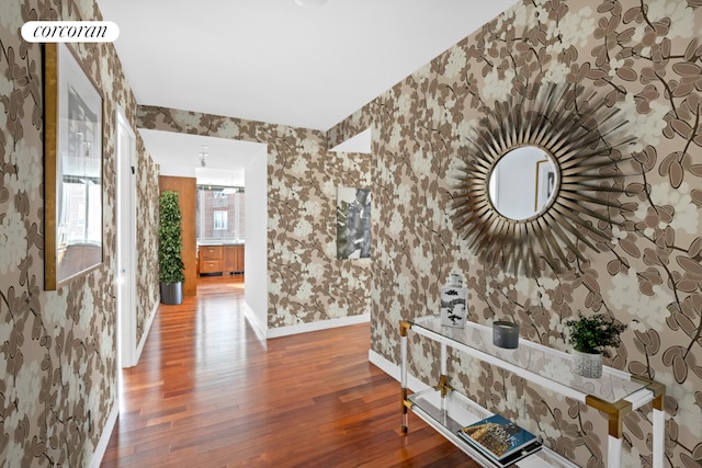 corridor featuring hardwood / wood-style floors