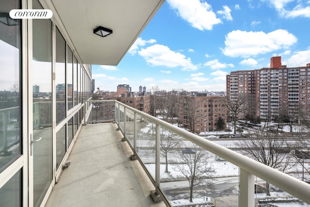 640 W 237th St Unit 7B, New York City, NY 10463 - snow covered back of property featuring a city view