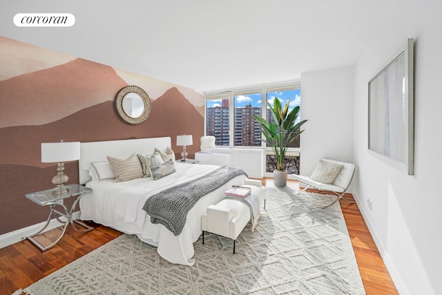 bedroom featuring hardwood / wood-style flooring