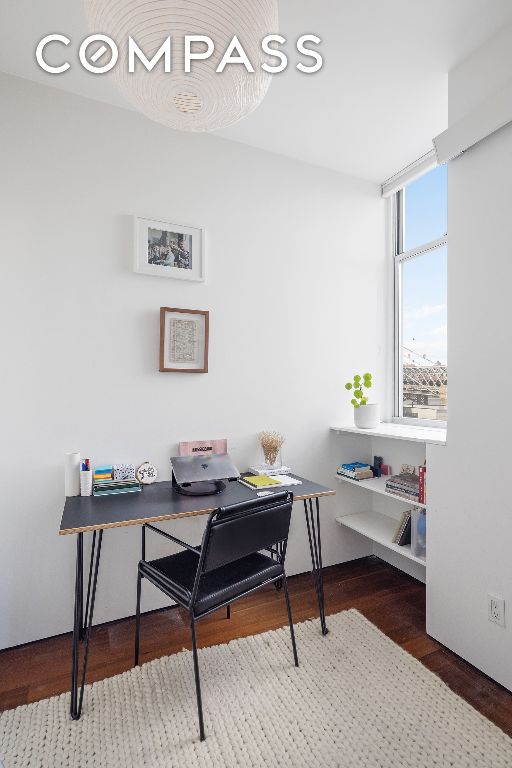 home office featuring dark hardwood / wood-style floors