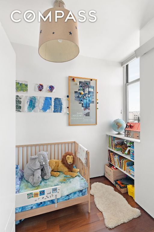 bedroom featuring hardwood / wood-style floors