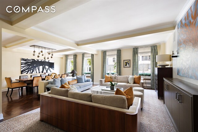 living room with crown molding, dark wood-type flooring, and beamed ceiling