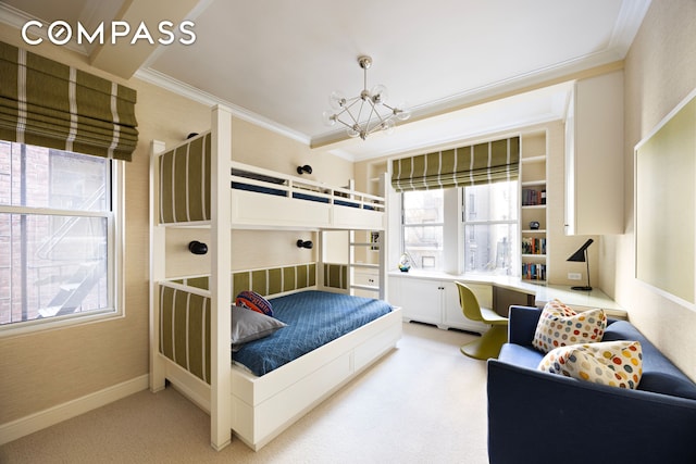 bedroom with an inviting chandelier, ornamental molding, and light carpet