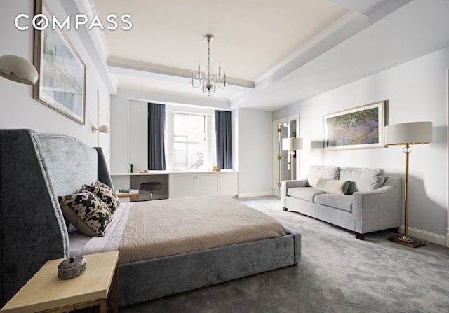 carpeted bedroom with crown molding, a notable chandelier, baseboards, and a tray ceiling