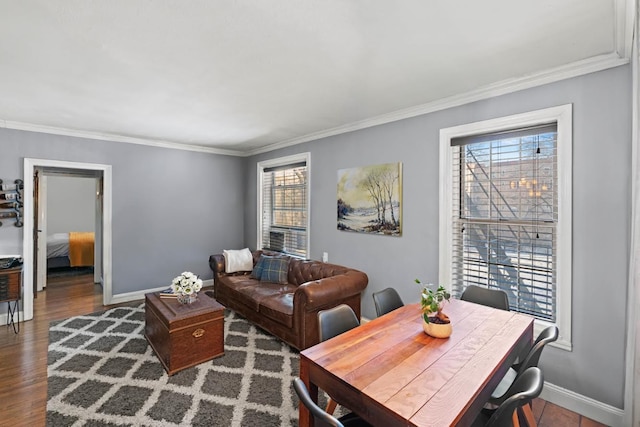 living room featuring ornamental molding and dark hardwood / wood-style flooring