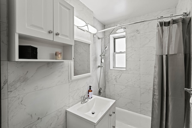 full bath featuring vanity and shower / bath combo with shower curtain