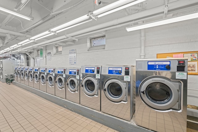 shared laundry area featuring independent washer and dryer