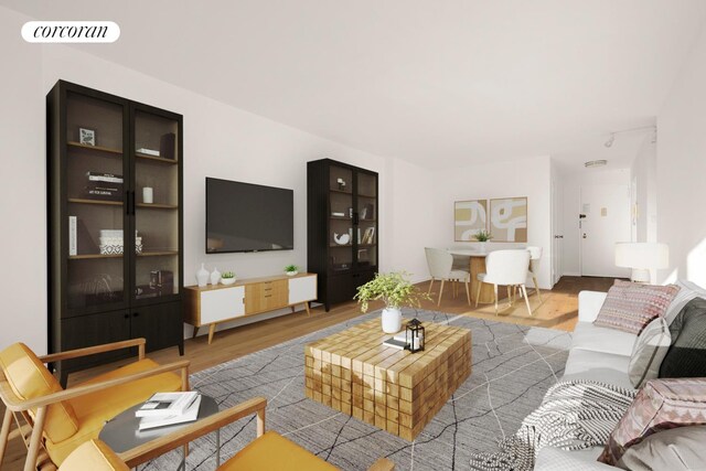 spare room featuring radiator heating unit and wood-type flooring