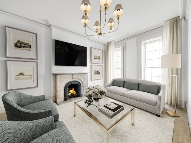 carpeted living room with a premium fireplace, ornamental molding, and an inviting chandelier