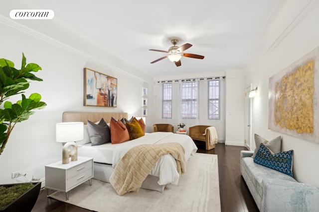 bedroom featuring visible vents, dark wood-type flooring, and ceiling fan