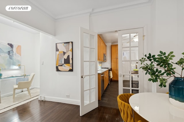 dining area featuring visible vents, baseboards, dark wood finished floors, and crown molding