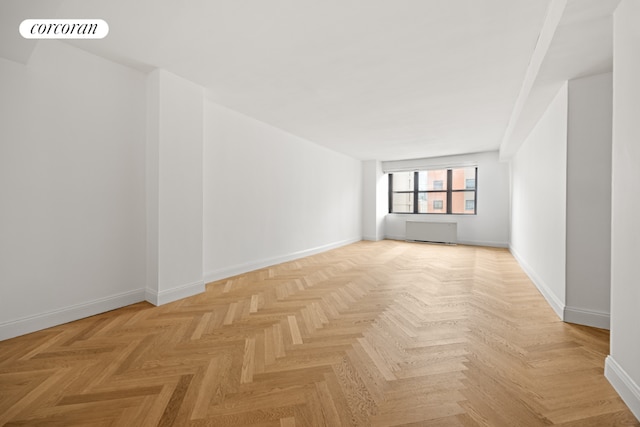 empty room featuring light parquet flooring