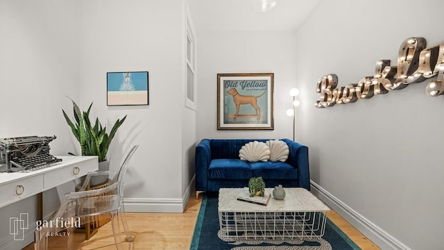 living area with wood-type flooring