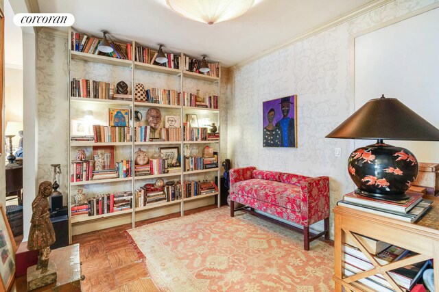 bedroom with hardwood / wood-style flooring and ornamental molding