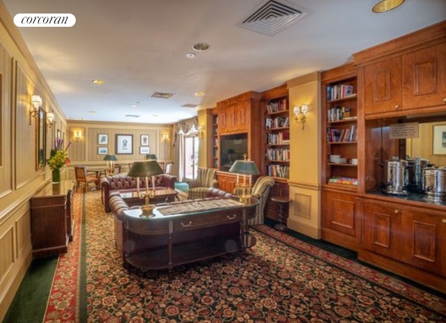 carpeted living area with visible vents