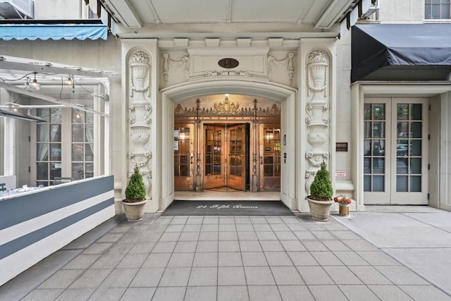 entrance to property featuring french doors