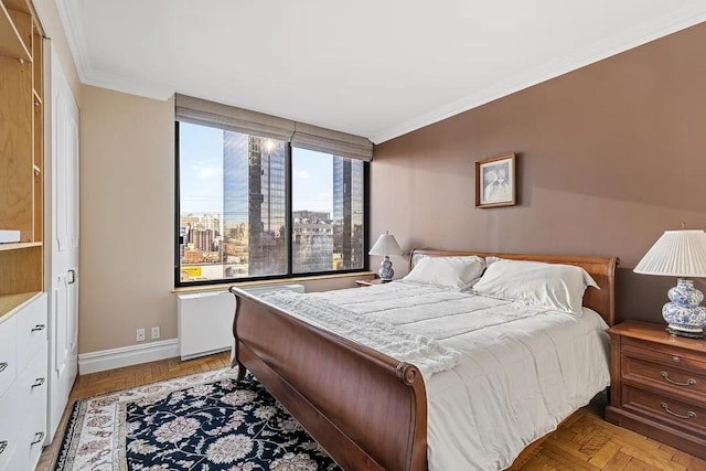 bedroom featuring light parquet floors and ornamental molding