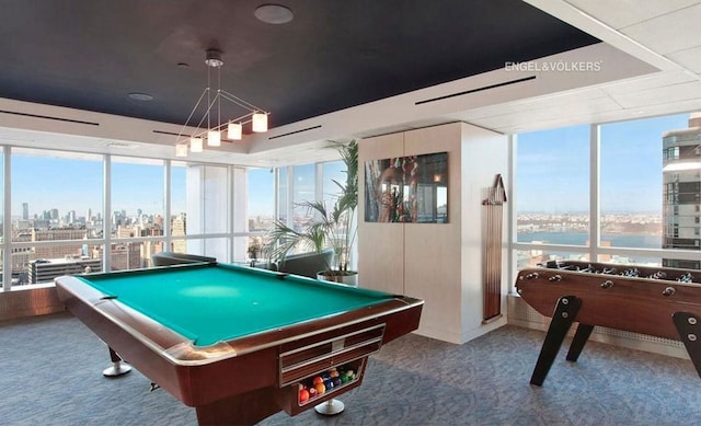 rec room featuring a city view, a water view, carpet flooring, and billiards