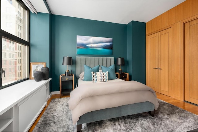 bedroom with light wood-type flooring