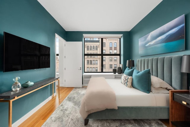 bedroom featuring hardwood / wood-style floors