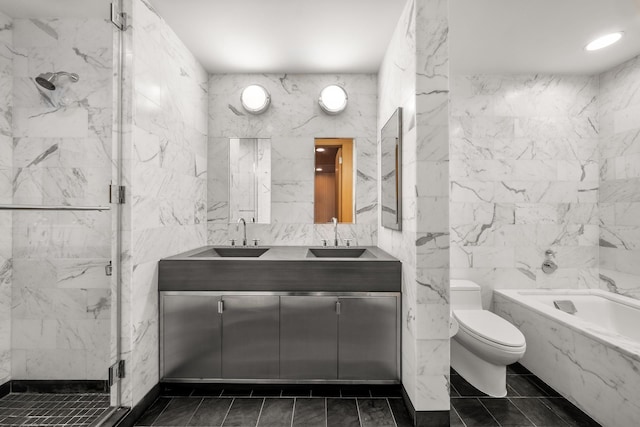 full bathroom featuring a marble finish shower, a tub with marble appearance, toilet, and a sink