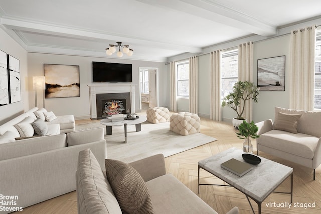 living room featuring beamed ceiling, ornamental molding, and light parquet flooring