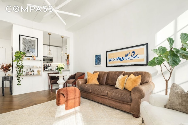 living room featuring parquet floors